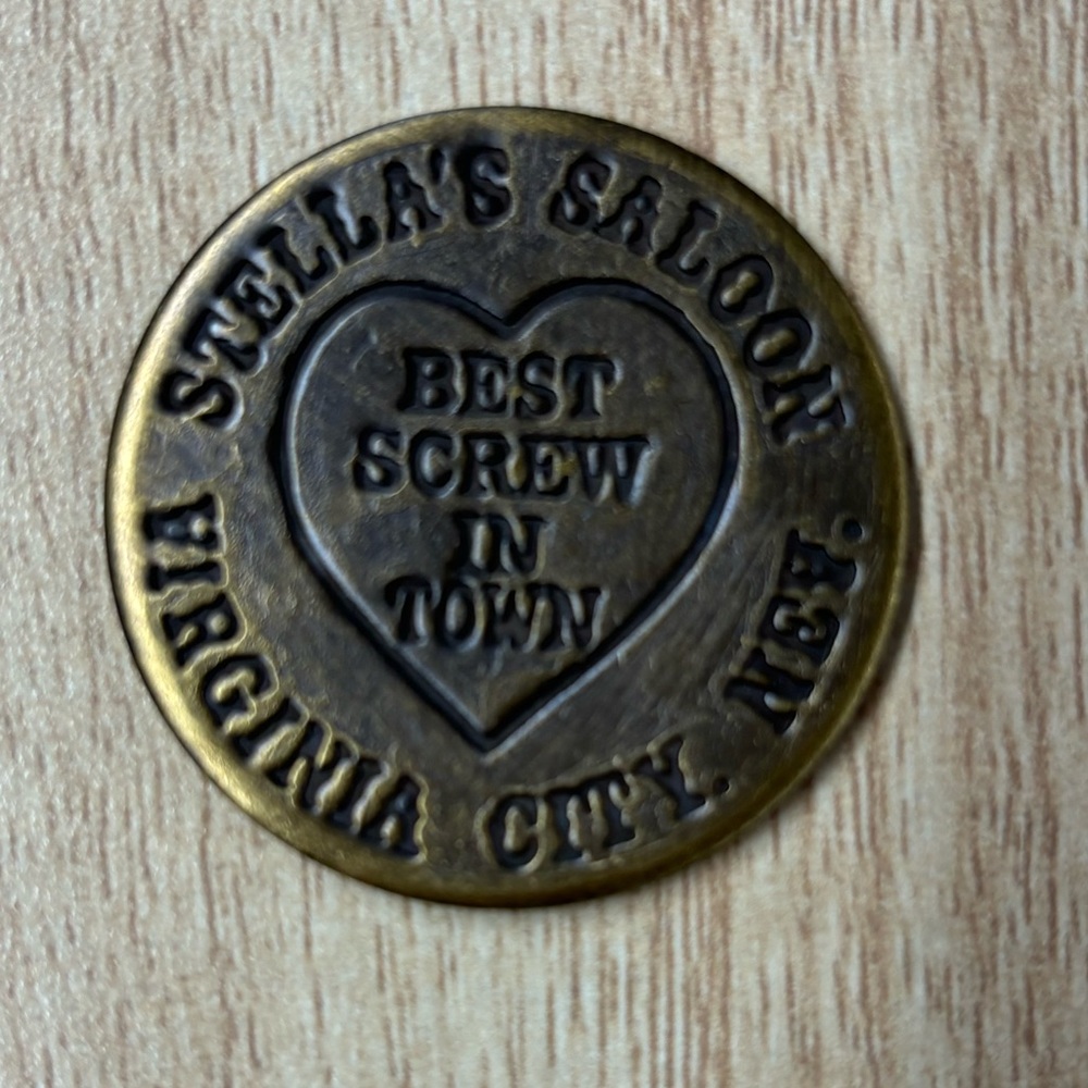 brothel coin brass token" Best Scr*w in town" Stella’s saloon.  Virginia city